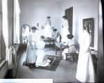 Students Doing Dress Fittings, c. 1910