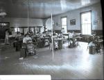 Students at Work in the Sewing Room [version 1], c. 1910