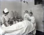 Doctor and Nurses Administering Anesthesia, c. 1909