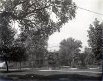 Academic Building Shrouded by Trees, c. 1909