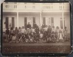 Apache Prisoners of War Upon Arrival Posed in Front of a Building, 1886