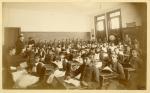 Male and female students in a classroom, c.1887