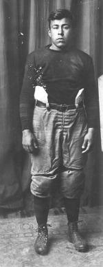 Joseph Bergie in football uniform, c.1911