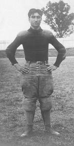 Charles Dillon posed in a field, c.1900