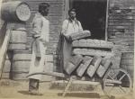 Samuel High Bear and Guy (Bear Don't Scare) at the school bakery, c.1880