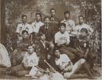 Twelve male students with baseball equipment, c.1896