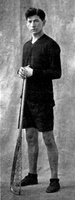 Edward Bracklin with lacrosse stick, c.1910