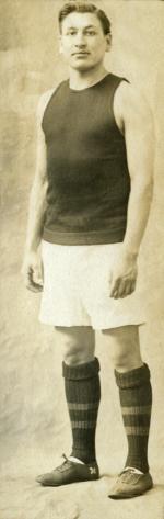 Louis Dupuis in basketball uniform, 1911