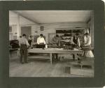 Students Pressing and Cleaning Clothes in the Tailor Shop, 1901