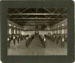 Female Students Doing Dumbbell Drill in Gymnasium [version 2], 1901