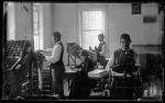 Students and Marianna Burgess in the print shop, c.1881