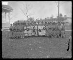 Group of Apache students with Richard Henry Pratt and two white men, c.1884