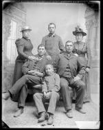 Two male students and families, c.1885