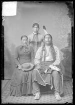 Knife Chief, a visiting chief, with two female students, c.1886