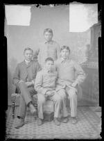 Wood Nashozey and three male Apache students, c.1890