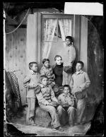 Six young male students with teacher Miss Shiverick, c.1882