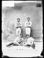 Four young men in baseball uniforms [version 1], c.1888