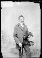 Reuben Wolf wearing false mustache, c.1887