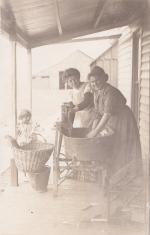 Ellen McCombs and Help Laundering Clothes, c.1910