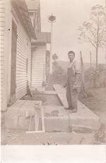 Harry John laying cement, #1, c.1914