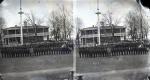 Students posed in rows in front of superintendent's house, c.1880