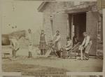 Students and instructor working in front of the blacksmith's shop [version 2], c.1880